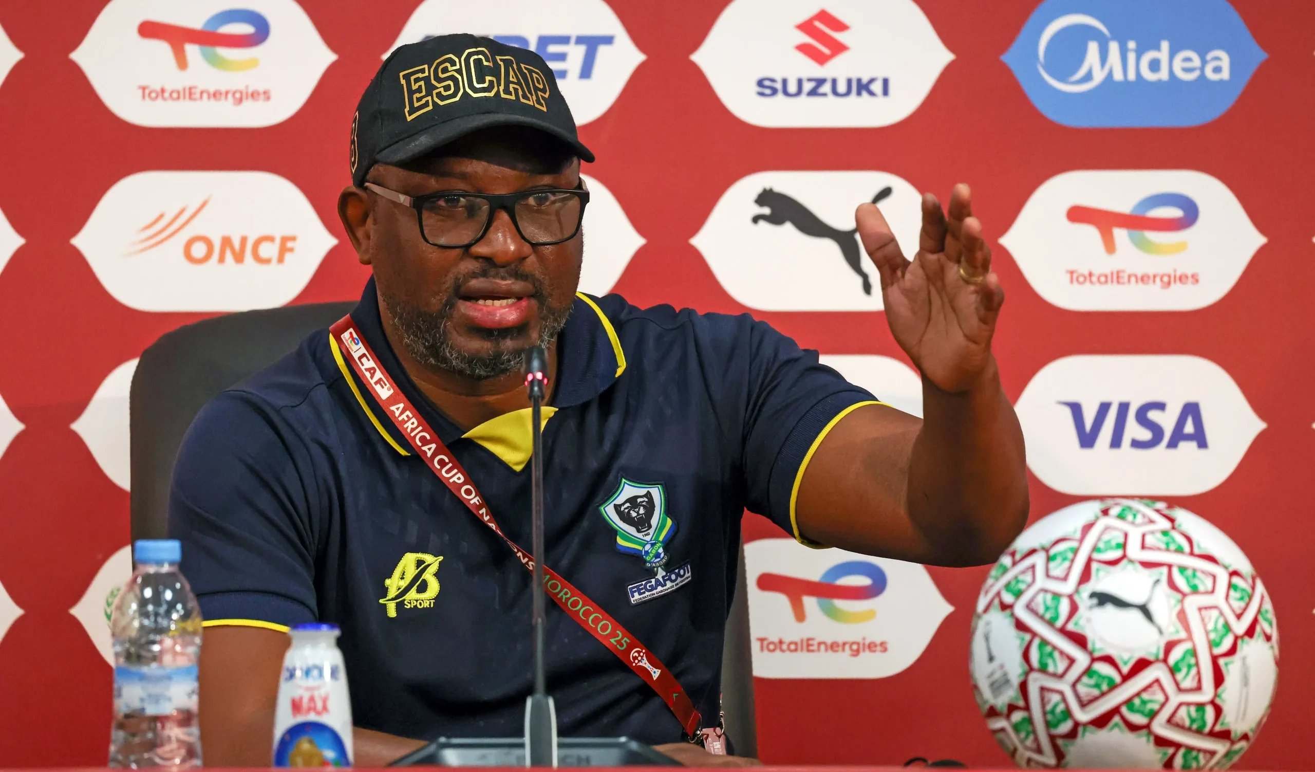 Gabon head coach Thierry Mouyouma speaking during an AFCON presser