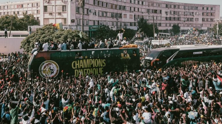 The Senegal national team parade their trophy on the streets of Dakar