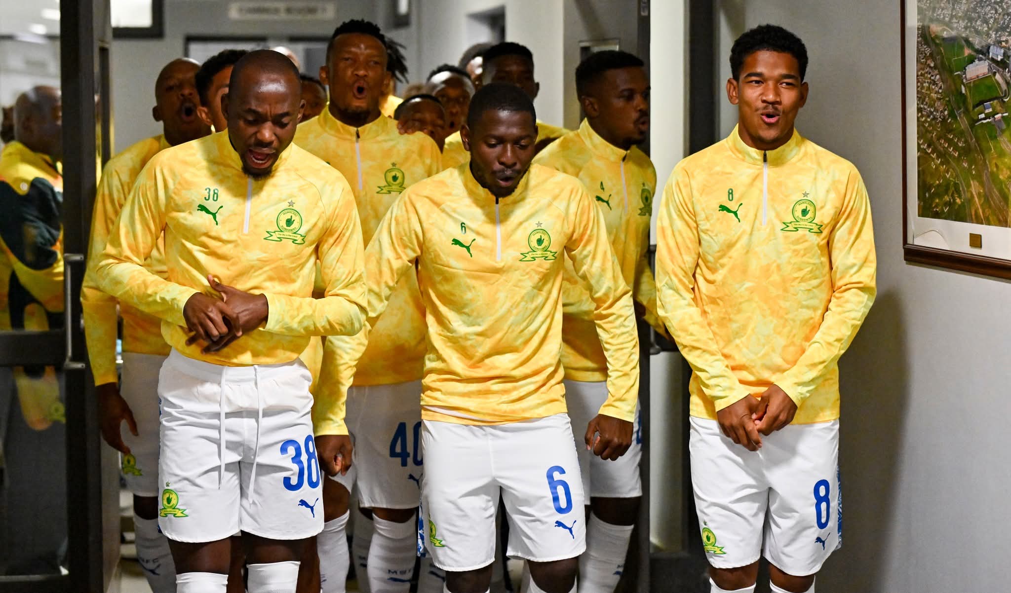 Mamelodi Sundowns players singing before a League match 