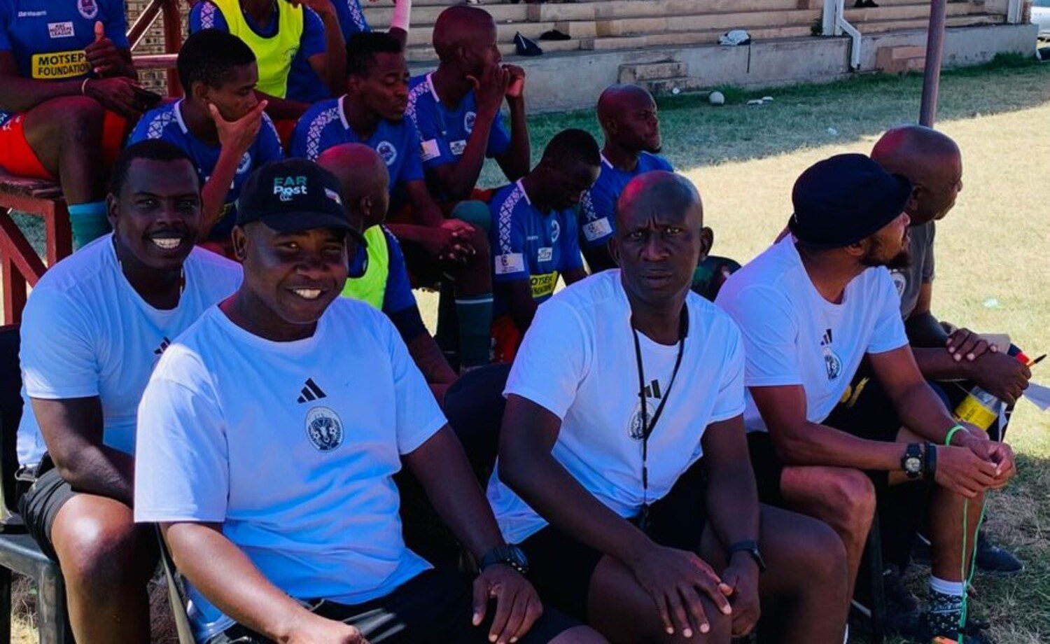 Garetshepe Monyai [in black cap] with Mavabaza United's technical team