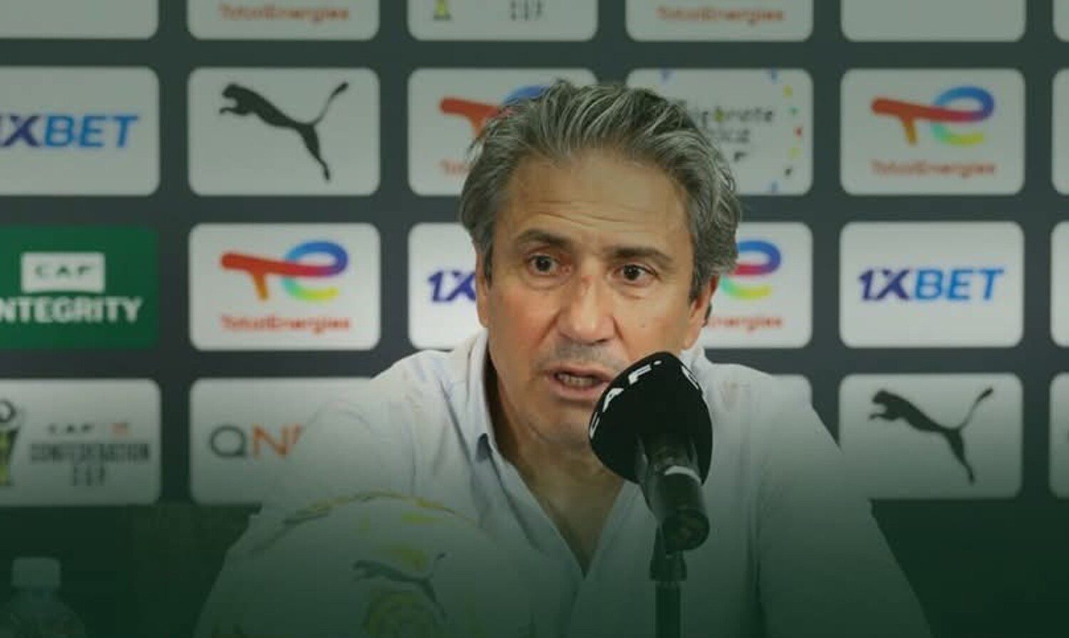 Al Masry head coach Nabil Kouki addressing members of the media