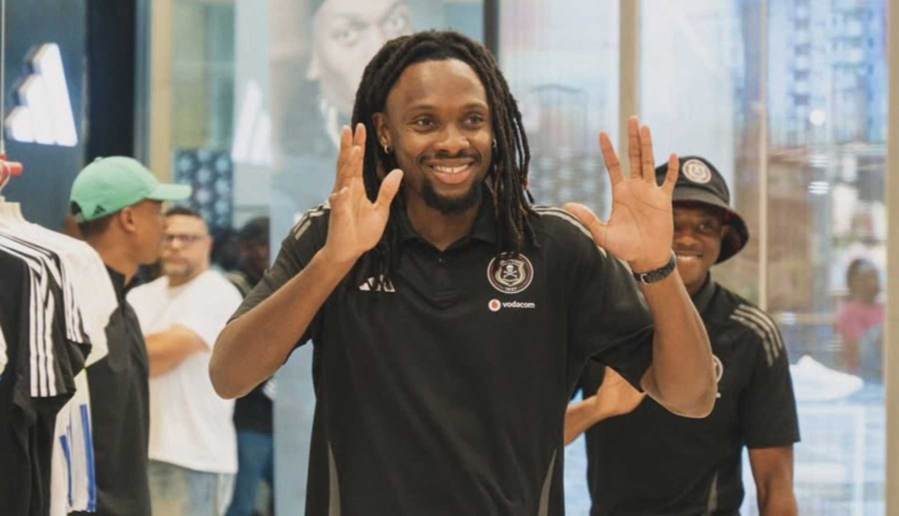 Olisa Ndah waving at supporters during an Orlando Pirates activation