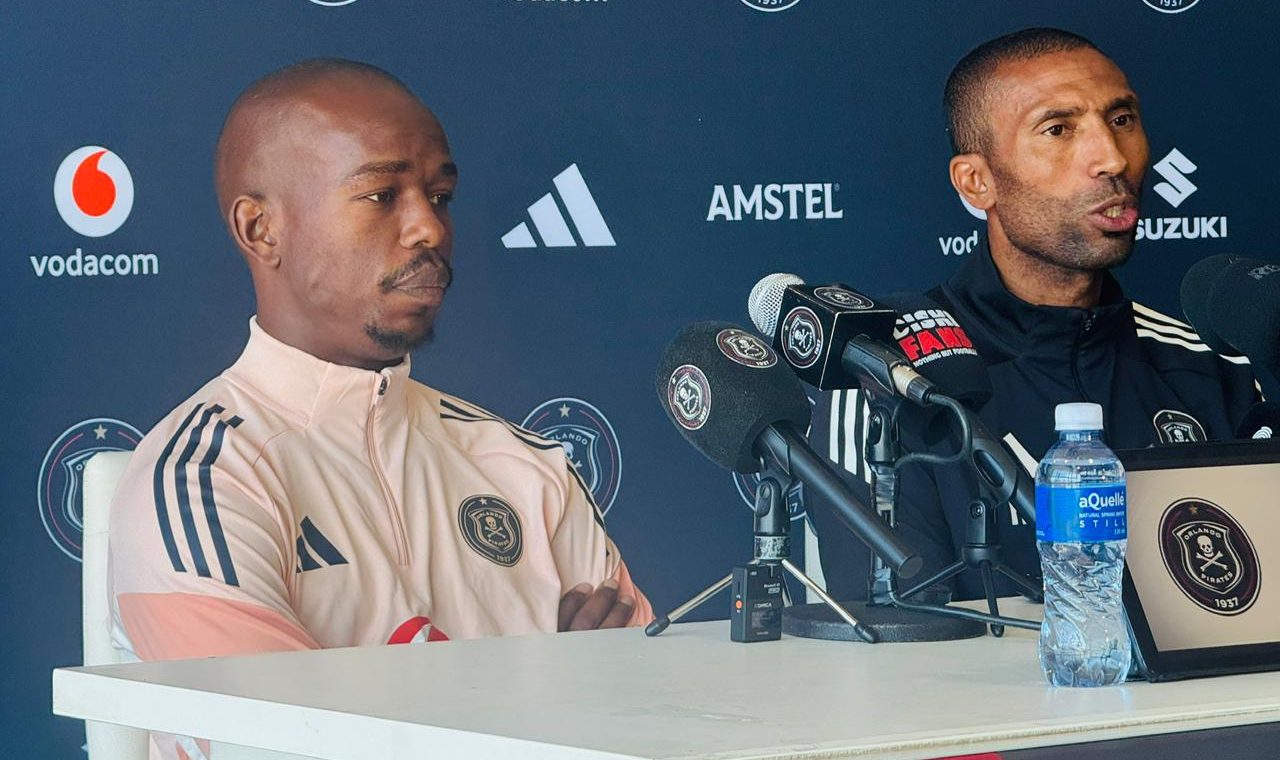Orlando Pirates head coach Abdeslam Ouaddou with Nkosinathi Sibisi addressing the media