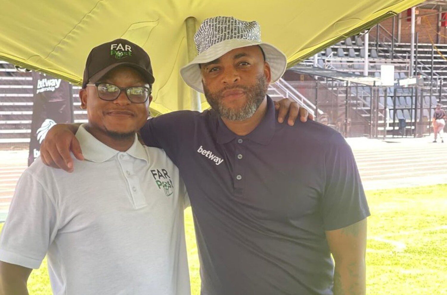 Oupa Manyisa with FARPost journalist Mauwane Raophala at Seshego Stadium