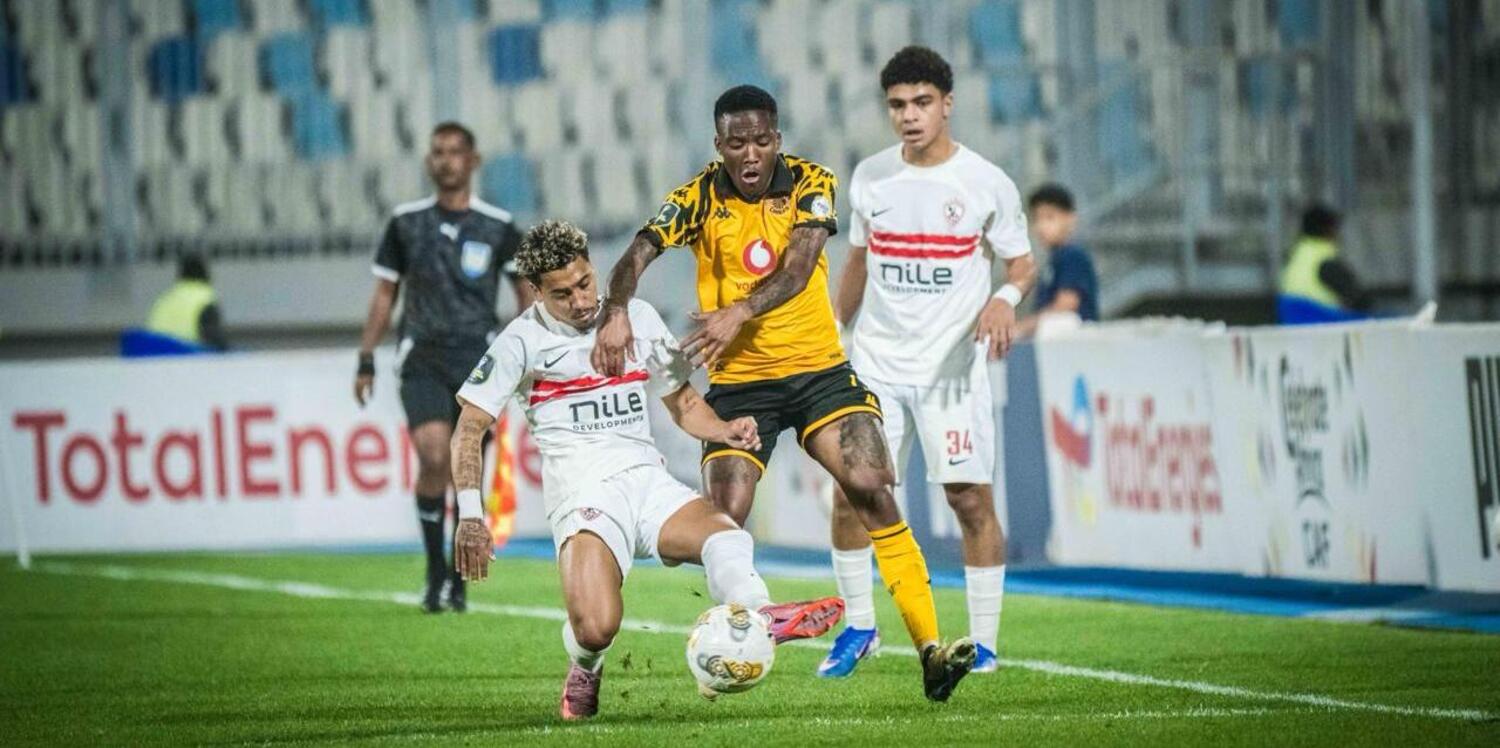 Pule Mmodi of Kaizer Chiefs challenging for the ball against a Zamalek player