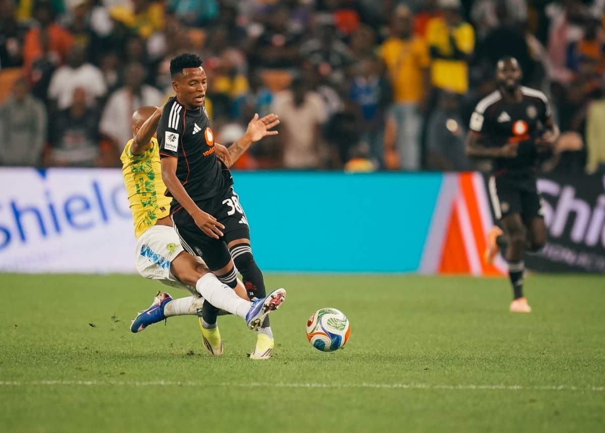 Orlando Pirates' Relebohile Mofokeng rides a challenge from Jayden Adams of Mamelodi Sundowns during a Betway Premiership game at the FNB Stadium. Image: Orlando Pirates
