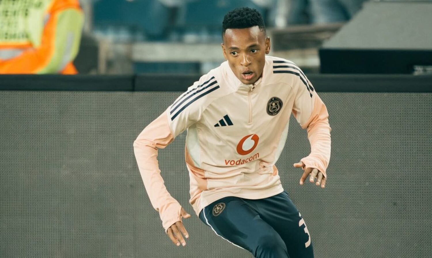 Relebohile Mofokeng warming up in Orlando Pirates colours