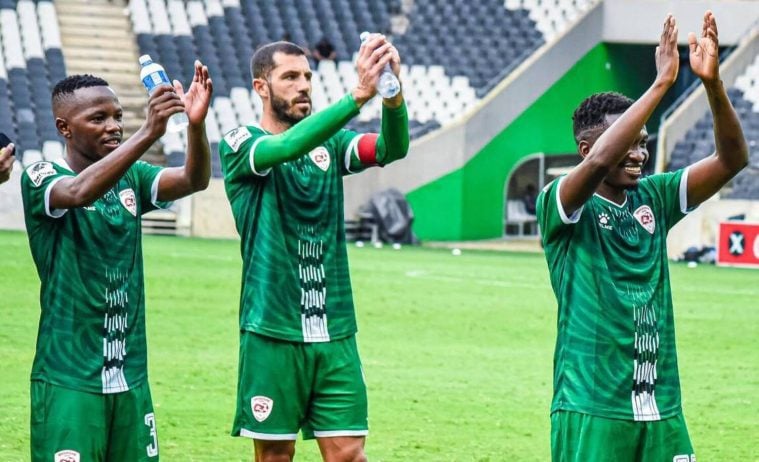 Sekhukhune United players Thato Khiba, Daniel Cardoso and Lesiba Nku saluting fans