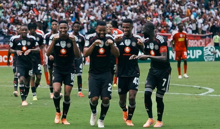 Sipho Mbule and Thalente Mbatha lead Orlando Pirates players celebrating a goal