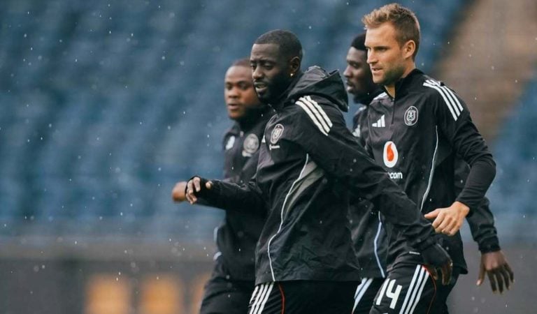 Orlando Pirates players Daniel Msendami, Deon Hotto and Andre de Jong warming up