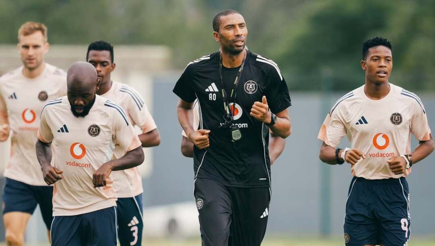 Orlando Pirates coach Abdeslam Ouaddou and his players going through their paces at training 