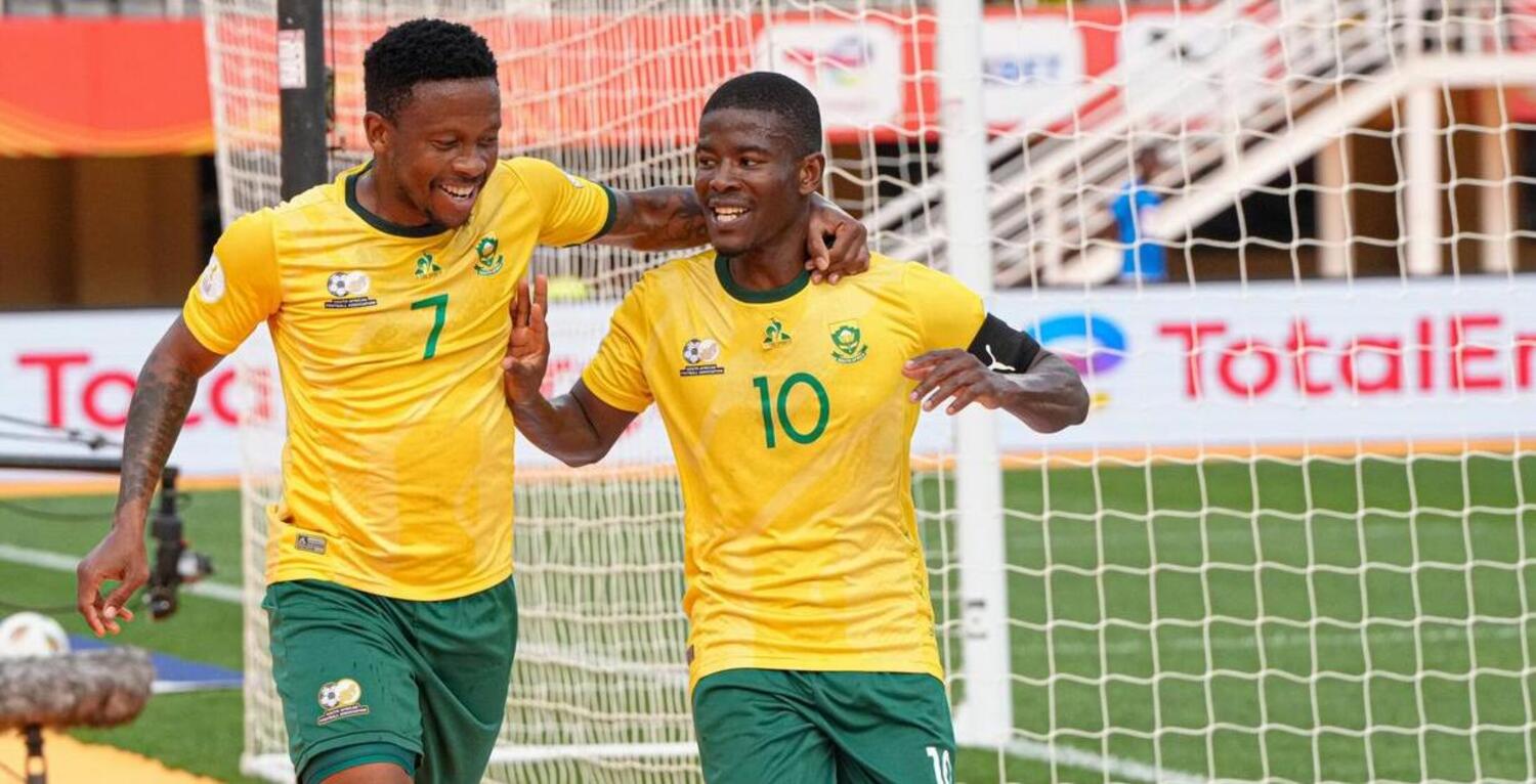 Bafana Bafana players Thabiso Kutumela and Neo Maema celebrating