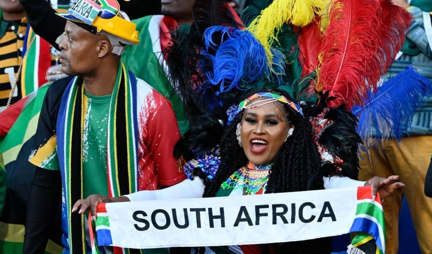 Bafana Bafana super fans celebrating at 2025 AFCON