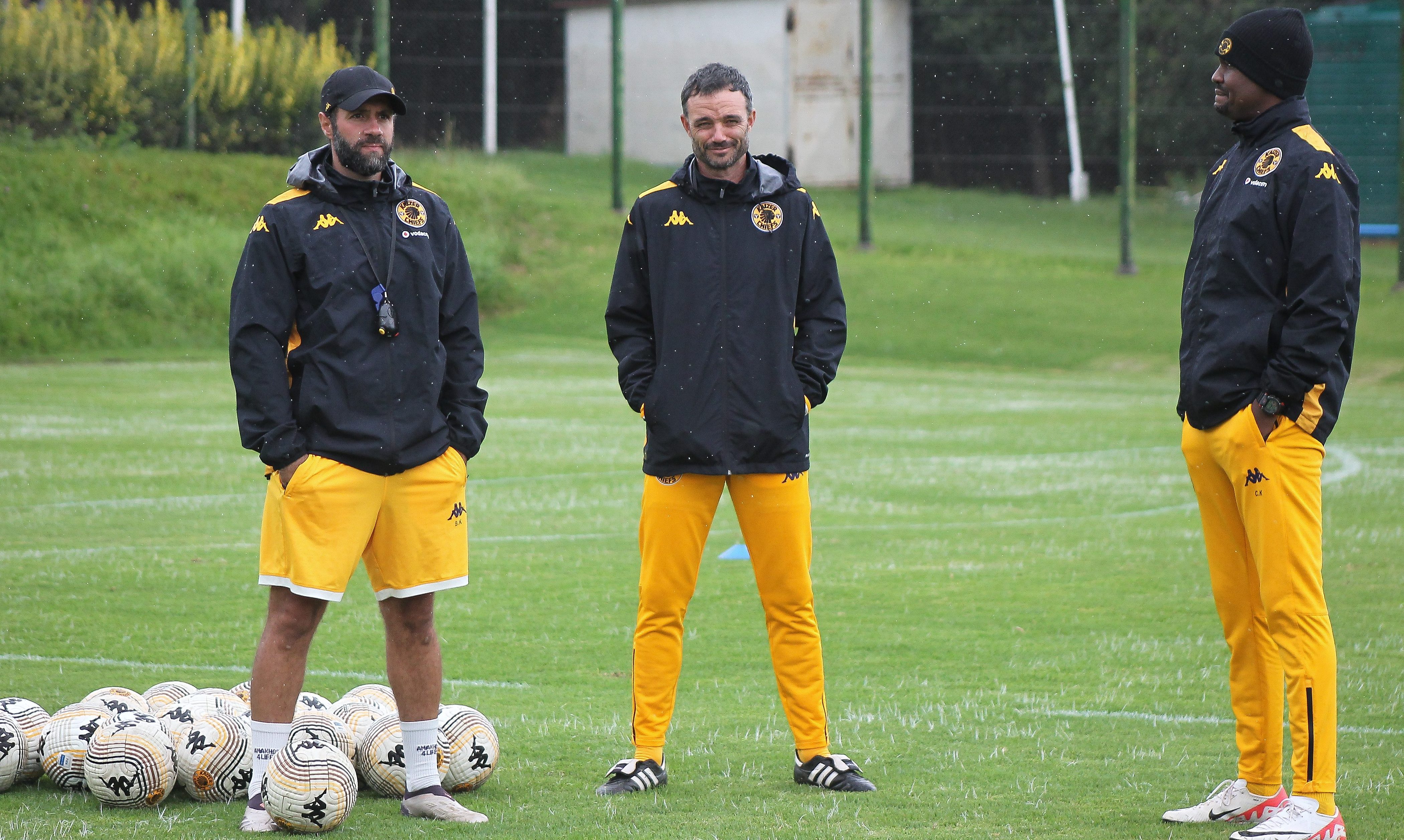 Cedric Kaze and Khalil Ben Youssef and Dillon Sheppard watching Kaizer Chiefs players train
