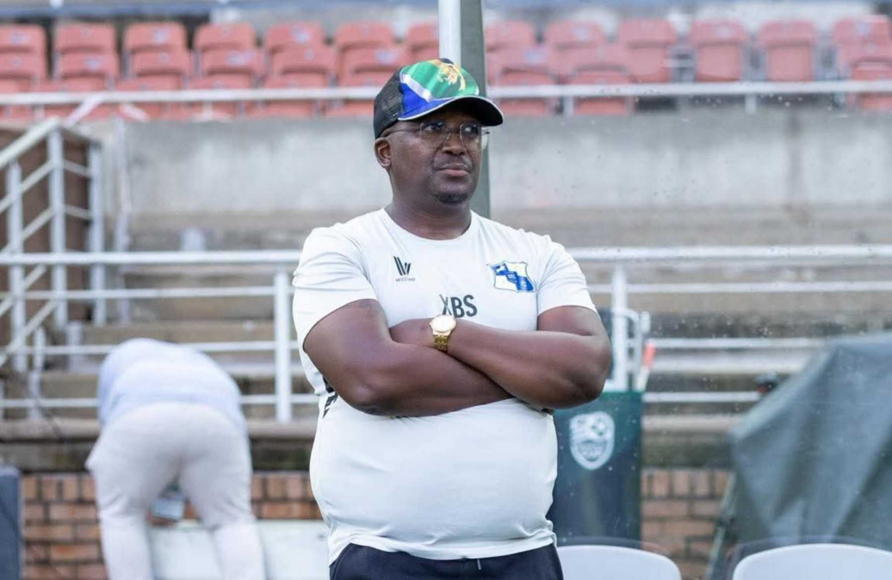 Dr Xanti Pupuma standing by the bench during the Nedbank Cup match against Sekhukhune United.