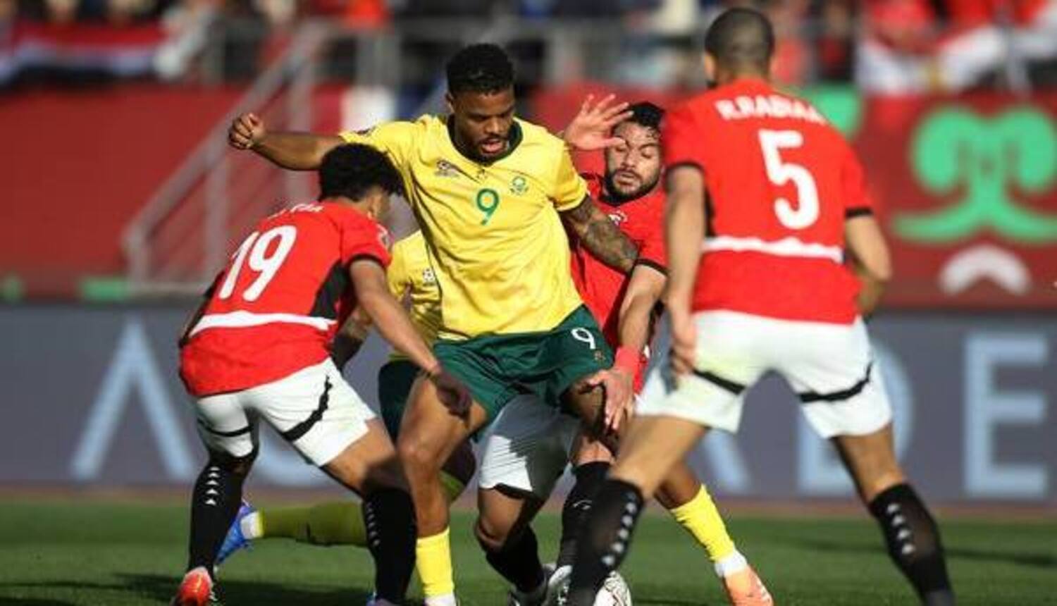 Bafana Bafana striker Lyle Foster trying to get past Egyptian defenders around him