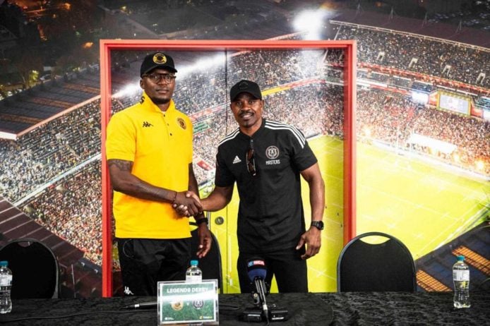 Morgan Gould and Lucky Lekgwathi shaking hands during a media briefing