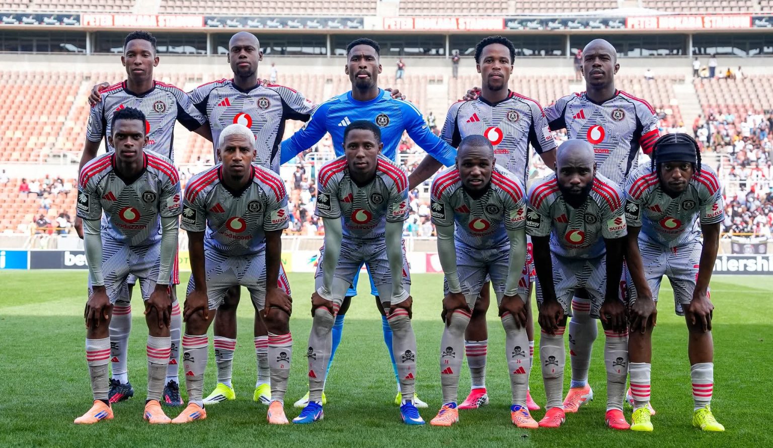 The Orlando Pirates line-up before a League match at the New Peter Mokaba Stadium