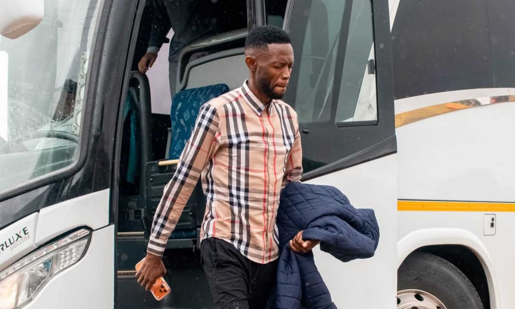 Chippa United Vusumuzi Vilakazi walking out of a bus before a match