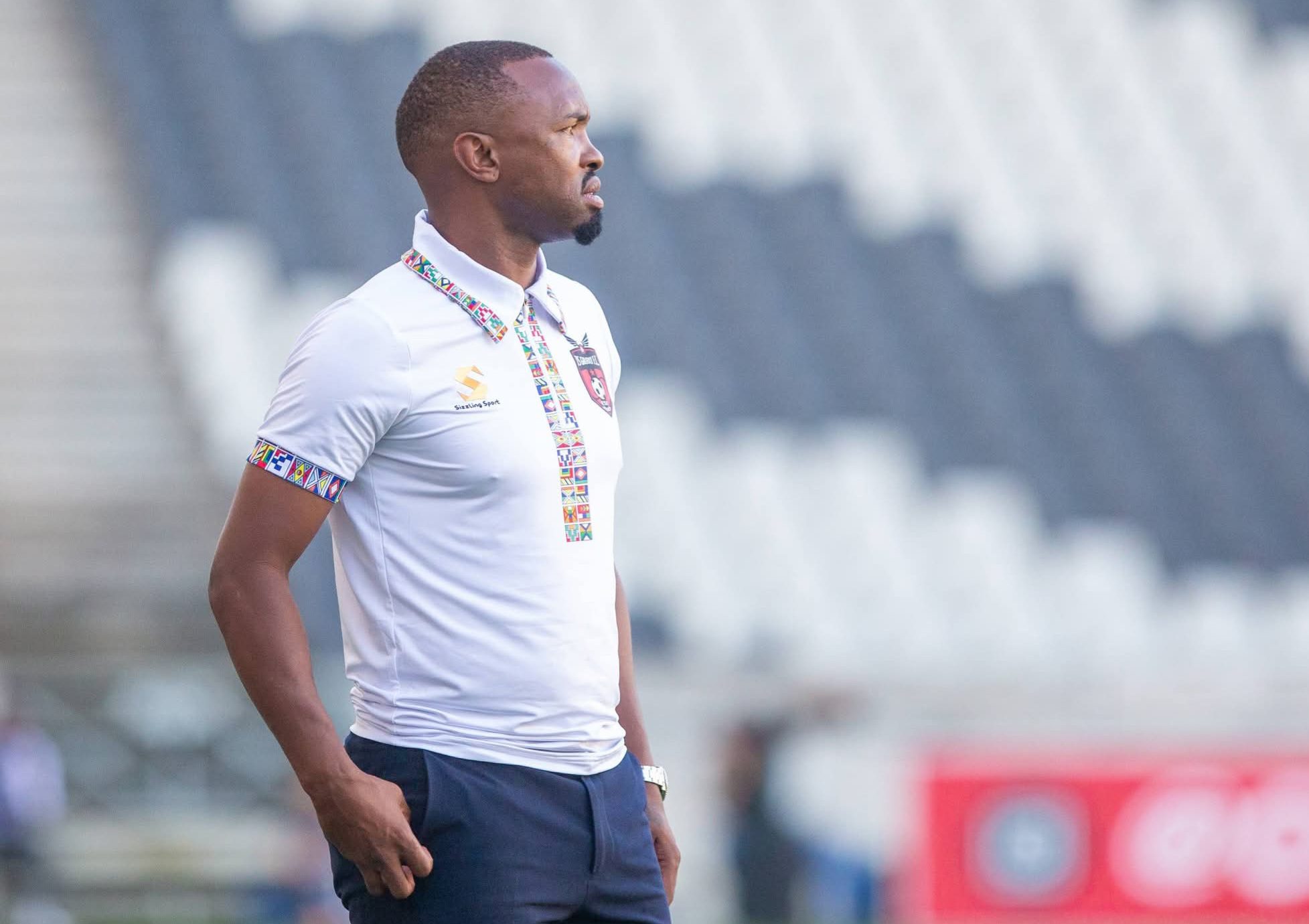 TS Galaxy interim coach Bernard Parker doing pitch inspection at Mbombela