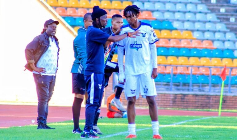 Botswana’s teenage star Floyd Motheo with Kaizer Chiefs legend Reneilwe ‘Yeye’ Letsholonyane during a game