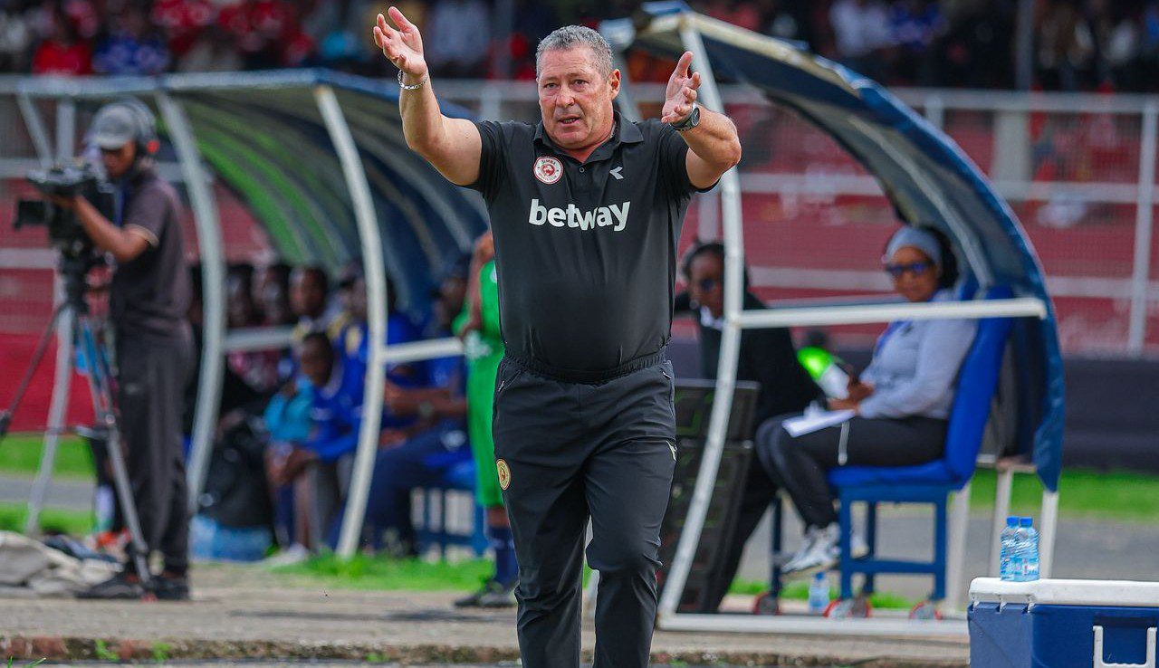 Coach Steve Barker on the touchline giving instructions to his Simba SC players