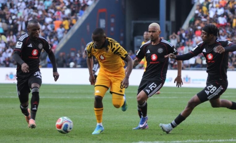 Orlando Pirates players Kamogelo Sebelebele, Oswin Appollis and Patrick Mswanganyi close in on Kaizer Chiefs midfielder Siphesihle Ndlovu