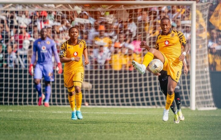 Kaizer Chiefs midfielder Lebohang Maboe controls the ball while Nkosingiphile Ngcobo backs him up