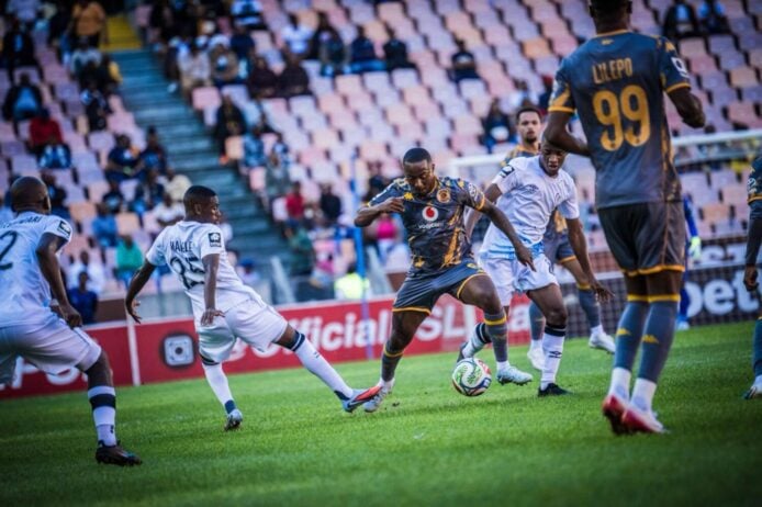 Kaizer Chiefs Lebohang Maboe dribbles past Orbit College defenders