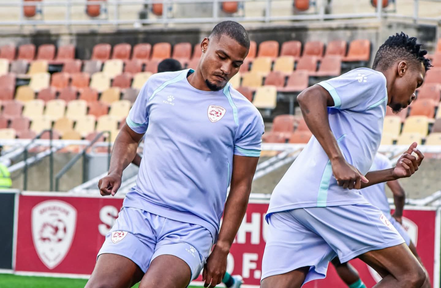 Rivaldo Coetzee doing warm-ups with Sekhukhune United at the New Peter Mokaba Stadium.