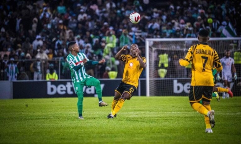 Siwelele FC midfielder Tebogo Potsane and Kaizer Chiefs' Thabo Cele tussle for aerial possession