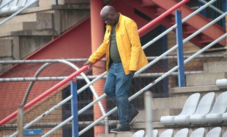 David Thidiela walking down the stairs after a their relegation from Motsepe Foundation Championship