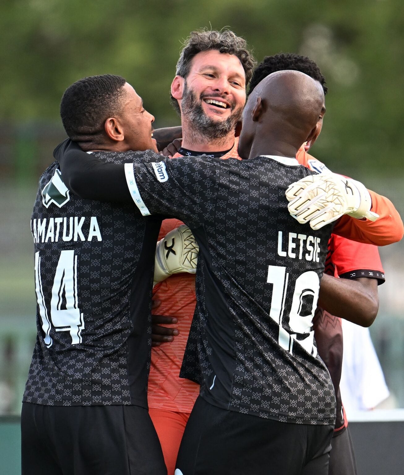 Durban City FC players celebrate after winning a Nedbank Cup game