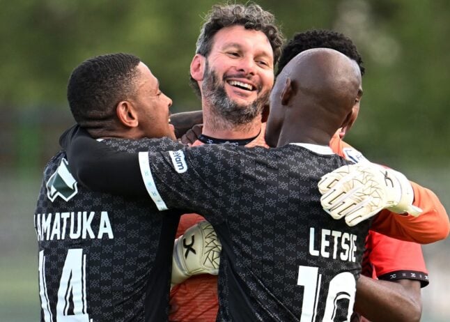 Durban City FC players celebrate after winning a Nedbank Cup game