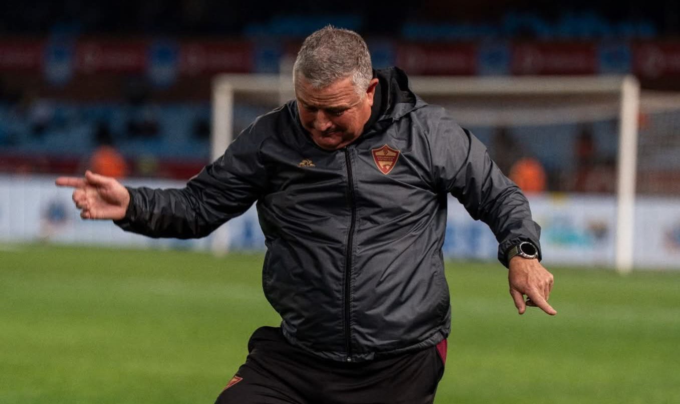 Gavin Hunt dancing on the touchline during a League match. 
