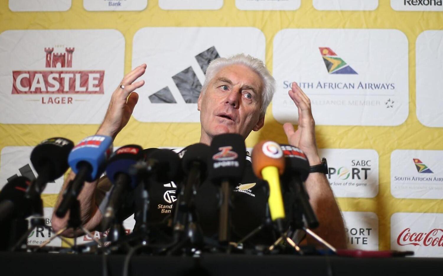 Hugo Broos addresses a press conference