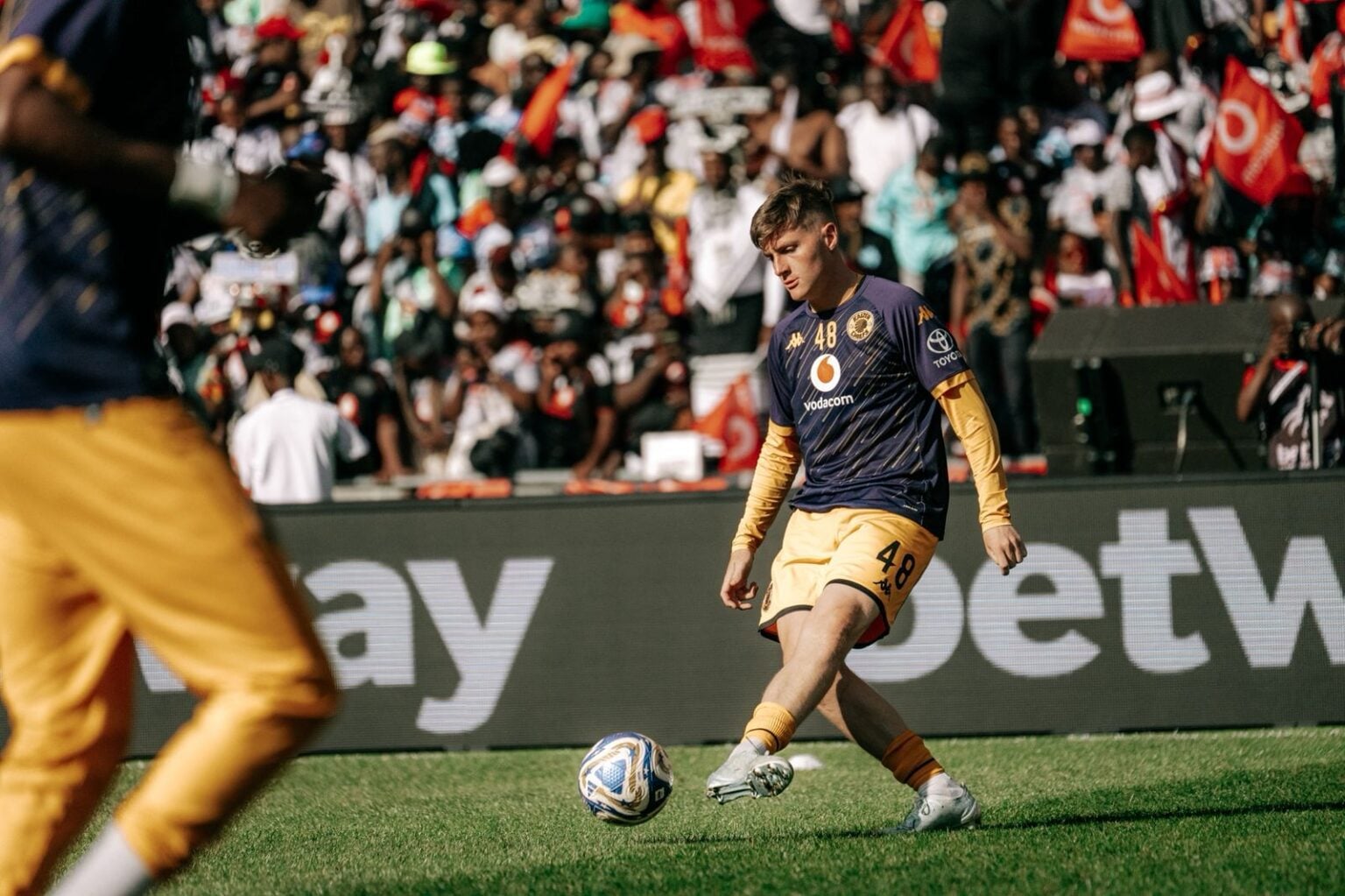 Kaizer Chiefs left-back Bradley Cross warm up