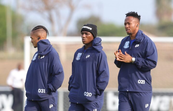 Magesi FC players during a pitch inspection before a league match