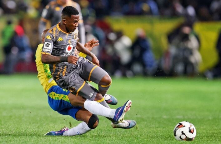 Mduduzi Shabalala being tackled by Jayden Adams during a League match