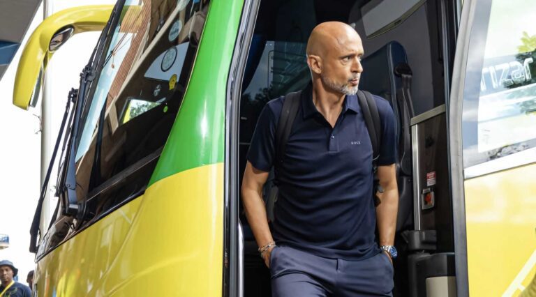 Mamelodi Sundowns coach Miguel Cardoso getting out of a team Bus ahead of a match.