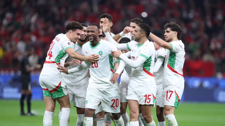 Morocco players celebrate a goal at AFCON