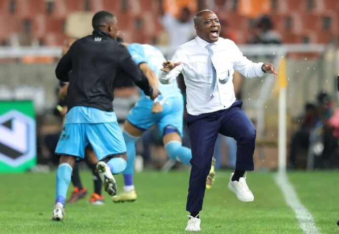 Durban City interim coach Pitso Dladla celebrate a goal against TS Galaxy