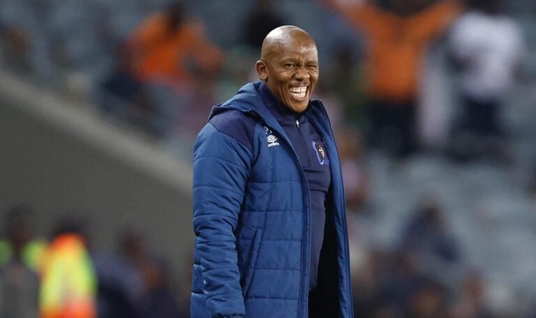 Pogiso Makhoye smiling during a League match against Orlando Pirates