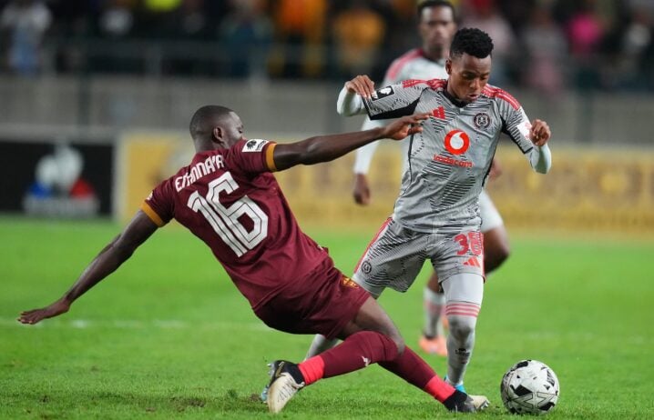 Relebohile Mofokeng taking on a Stellenbosch FC defender during a League match at Athlone Stadium.