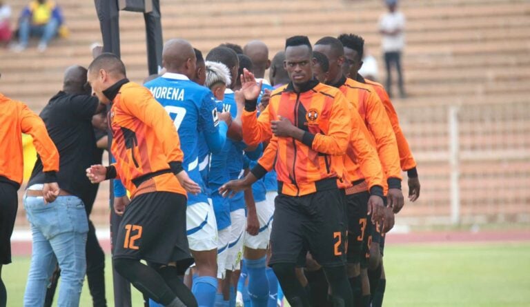 Thabang Matuludi greeting the Mamelodi Sundowns players before a League match.