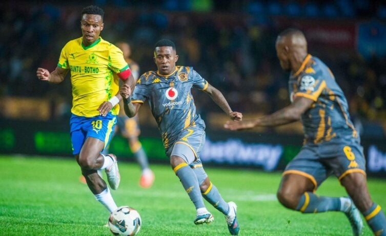 Mamelodi Sundiowns captain Themba Zwane challenging for posession against Kaizer Chiefs' Mduduzi Shabalala