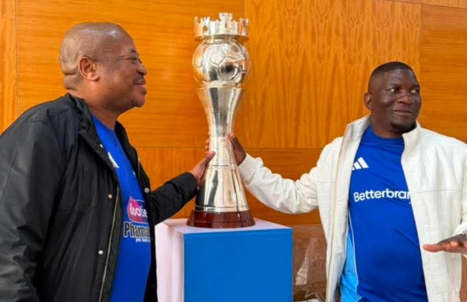Scottland FC boss Scott Sakupwanya and Kaizer Chiefs Football Manager Bobby Motaung in Harare.