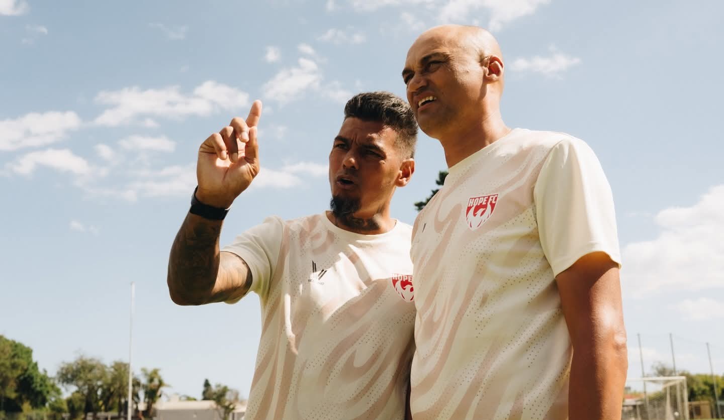 Clayton Daniels and coach Dylan Dean during Hope FC's training session