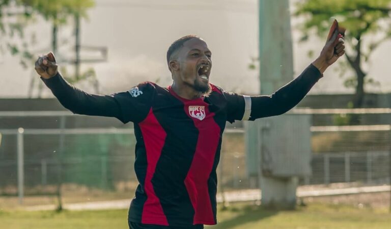 Craig Martin in celebratory mood after scoring for Hope FC