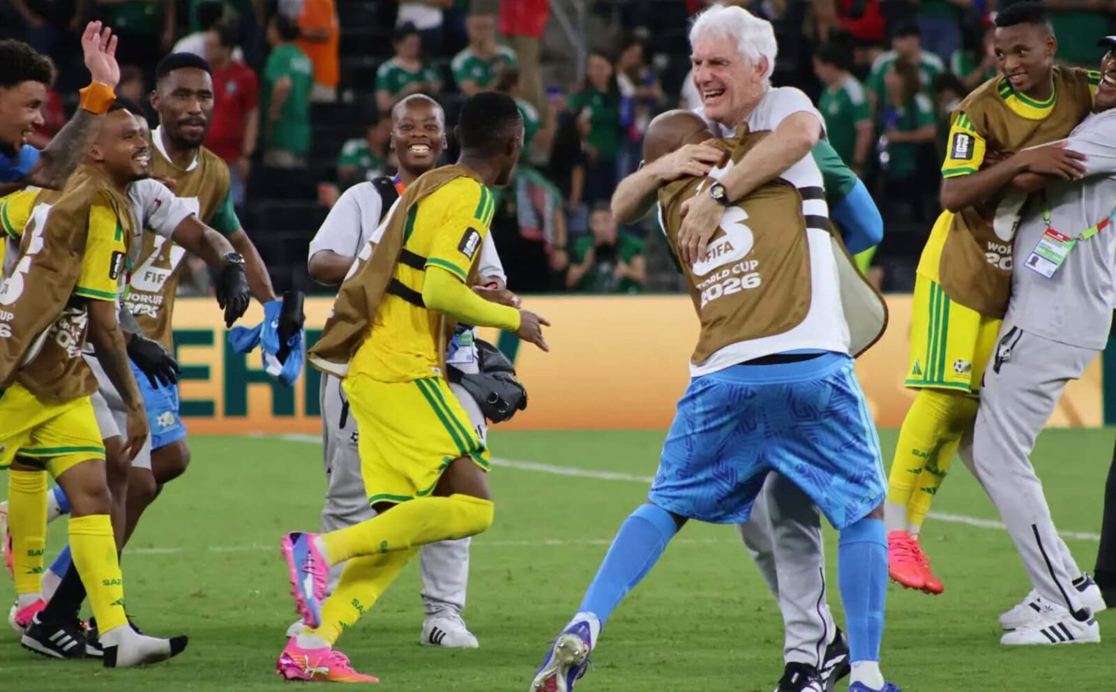 Hugo Broos celebrates with Bafana Bafana players